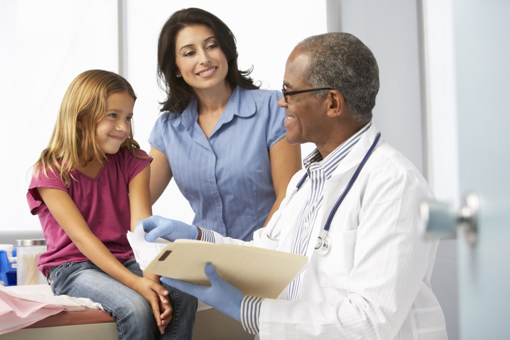 Doctor consulting with patients.
